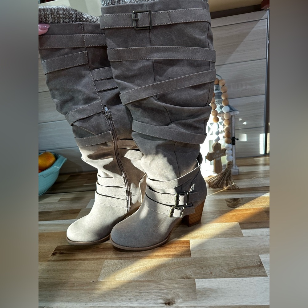 Brand New never worn. Just Fab boots with sweater too.